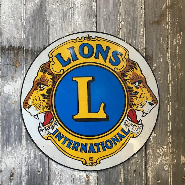 Vintage Lions International Metal Sign | Tramps UK